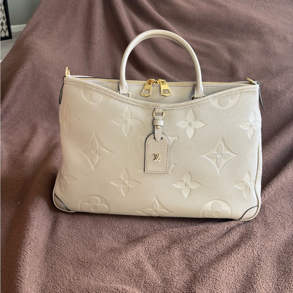 Elegant Cream Designer Handbag